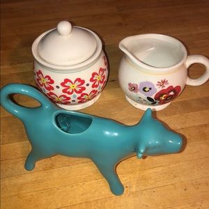 Pioneer Woman cow/creamer, sugar, creamer holder.